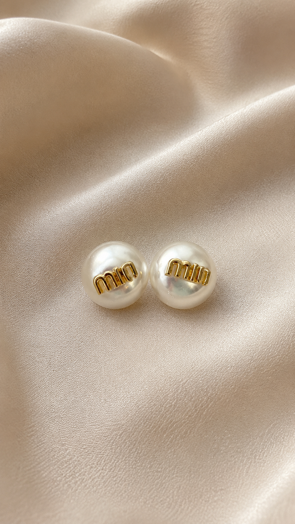 Boucles d’oreilles INTI